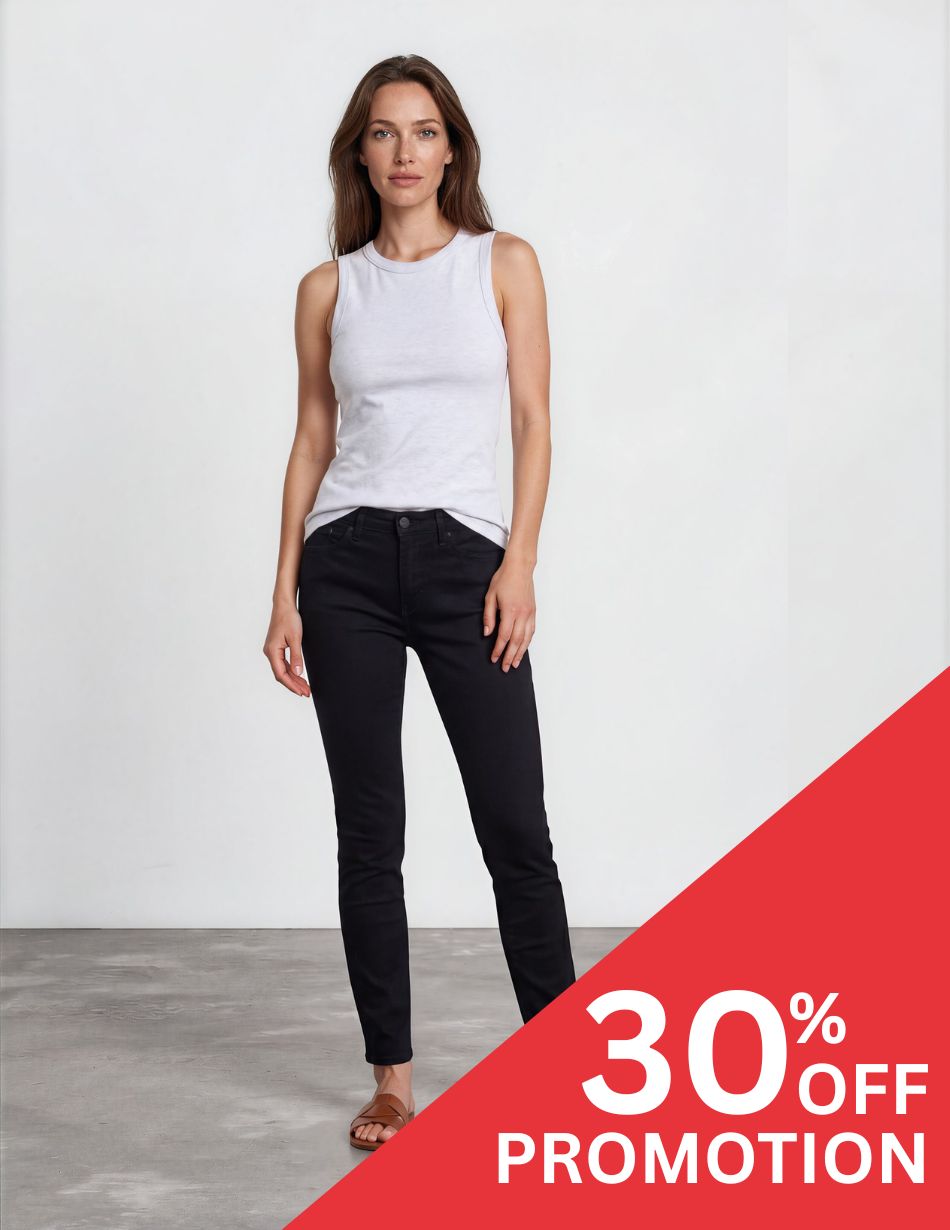 SHERI SLIM BLACK DIS Model wearing a white sleeveless top and black jeans, posing in a studio with a red 30% OFF promotion banner in the corner.