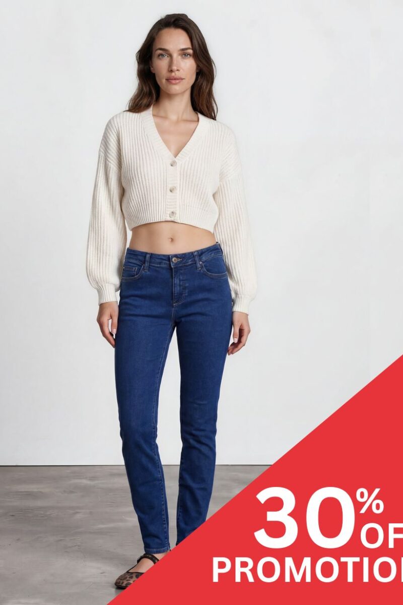 Model wearing a cream cropped knit cardigan and blue jeans in a studio; red promotional overlay reads '30% OFF' in the corner