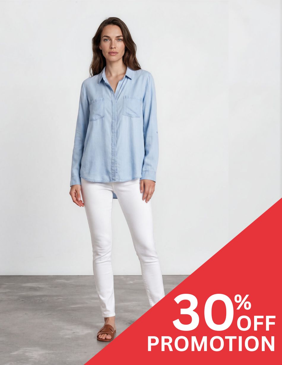 Ami Skinny White DIS Model wearing a light blue button-down shirt and white jeans against a plain background with a red 30% OFF promotion banner in the bottom-right corner.